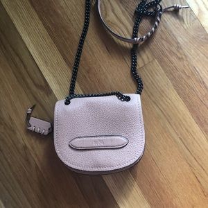 Dusty pink COACH crossed body clutch